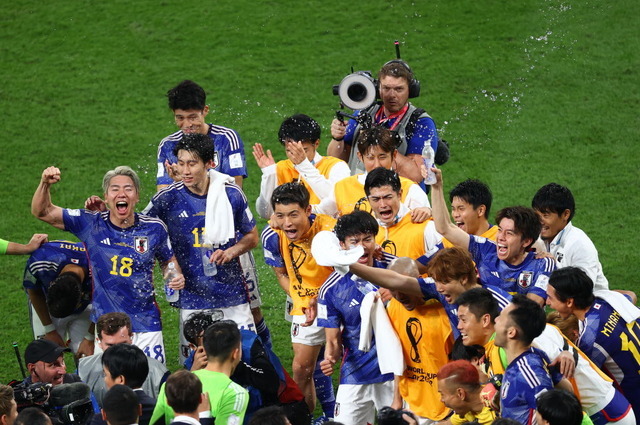 Germany v Japan: FIFA World Cup 2022DOHA, QATAR - NOVEMBER 23: Players of Japan celebrate after winning FIFA World Cup Qatar 2022 Group E match against Germany at Khalifa International Stadium in Doha, Qatar on November 23, 2022. (Photo by Evrim Aydin/Anadolu Agency via Getty Images)