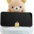 「リラックマ　スマホスタンドぬいぐるみ」使用例（C）2025 SAN-X CO., LTD. ALL RIGHTS RESERVED.