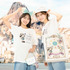 8つのテーマポートがデザインされたカチューシャ、ハット、Tシャツ